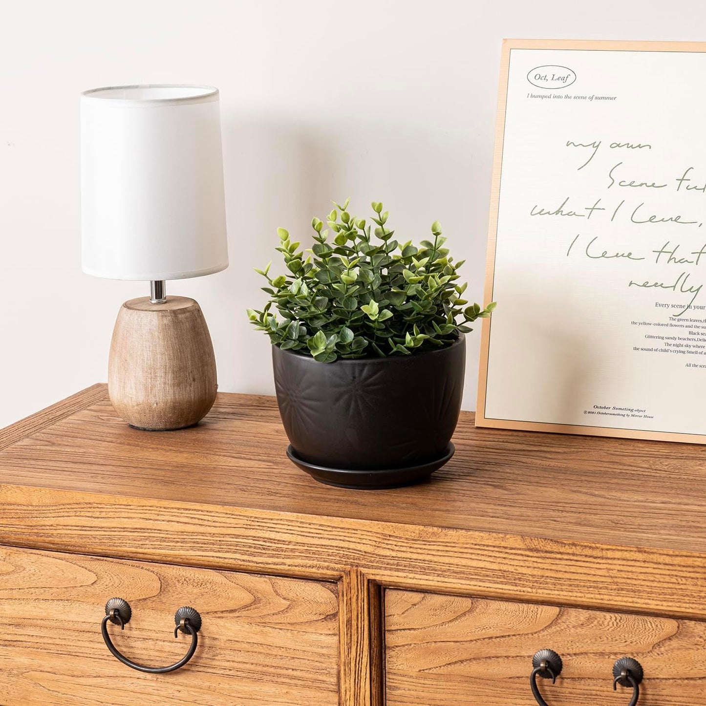 MyGift 7 Inch Round Matte Black Ceramic Plant Pot with Drainage Hole and Attached Saucer, Modern Decorative Embossed Sunburst Planter Container for Indoor Home Garden