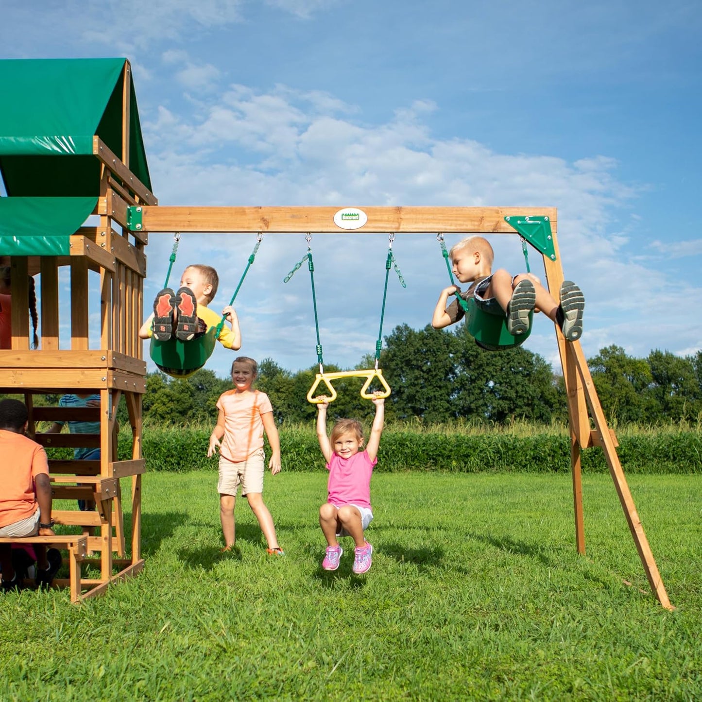 Backyard Discovery Belmont Cedar Wood Swing Set with Wave Slide, Play Deck, Rock Wall Ladder, Snack Bar Window, Shaded Picnic Area, Bench, Belt Swings, Trapeze, Sandbox Area, Canopy, Outdoor Playset