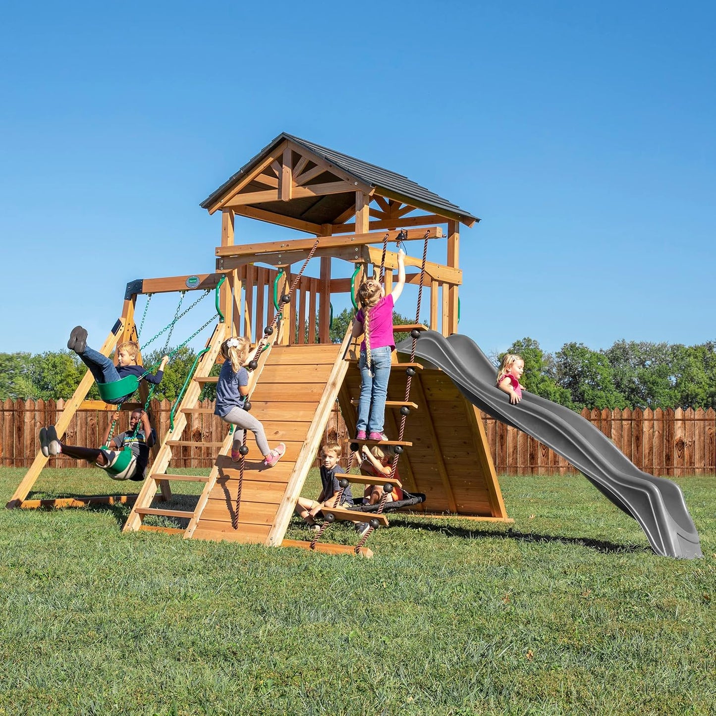 Backyard Discovery Endeavor Cedar Wood Swing Set with Wave Slide, Play Deck, Double Rock Wall, Rope Ladder, Climbing Wall, Belt Swings, 40-Inch Web Swing, Step Ladder, Toy Telescope, Outdoor Playset
